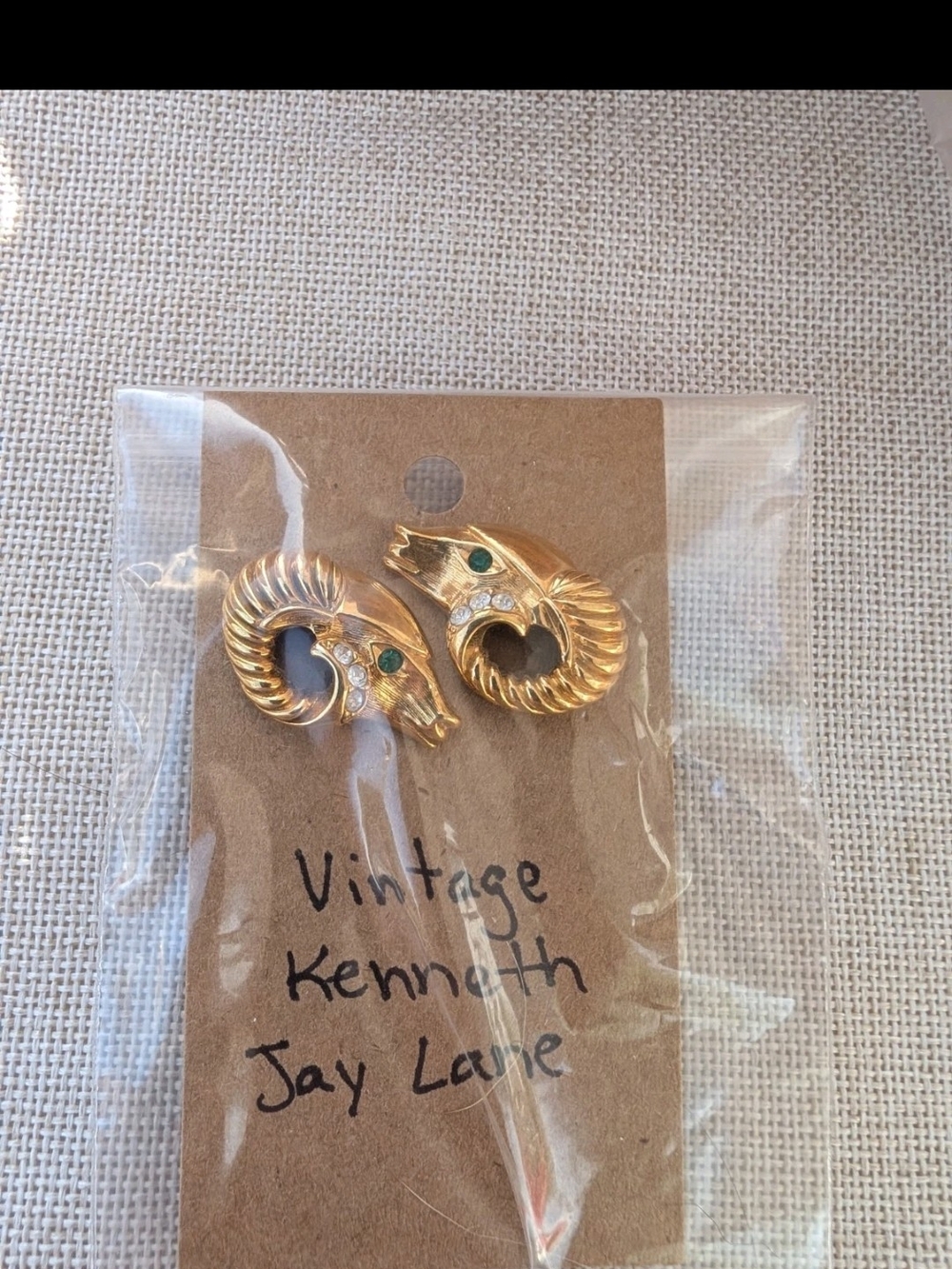 Kenneth Jay Lane Gold Ram Head Earrings with Green Crystal Eyes